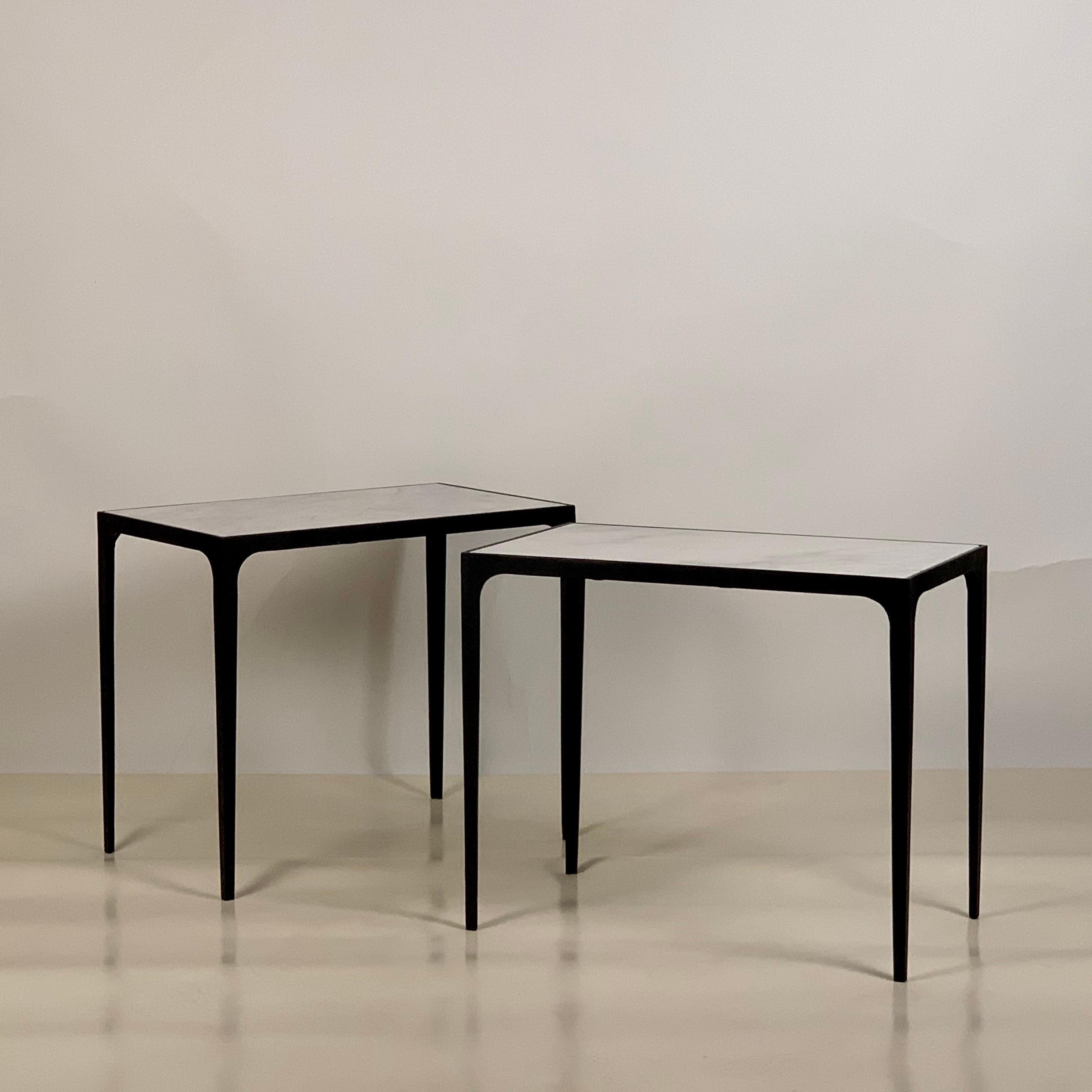 Pair of large 'Esquisse' wrought iron and white marble side or end tables by Design Frères. Versatile, elegant and understated.