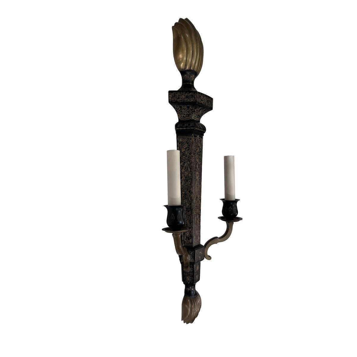 Pair of circa 1950's anglo Indian etched metal sconces with foliage motif.

Measurements:
Height: 26