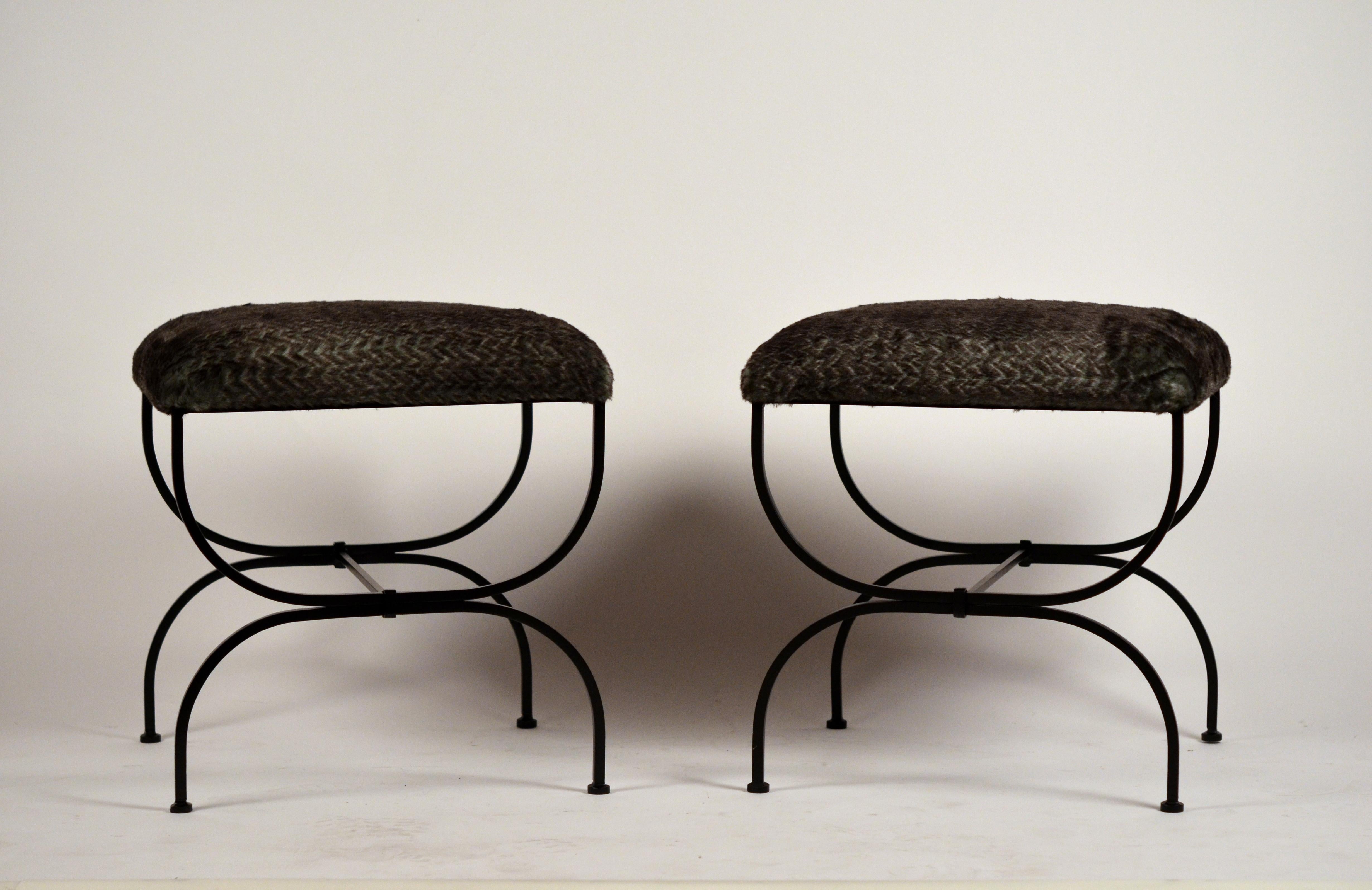 Pair of large faux fur 'Strapontin' stools by Design Frères.

Environmentally conscious design.