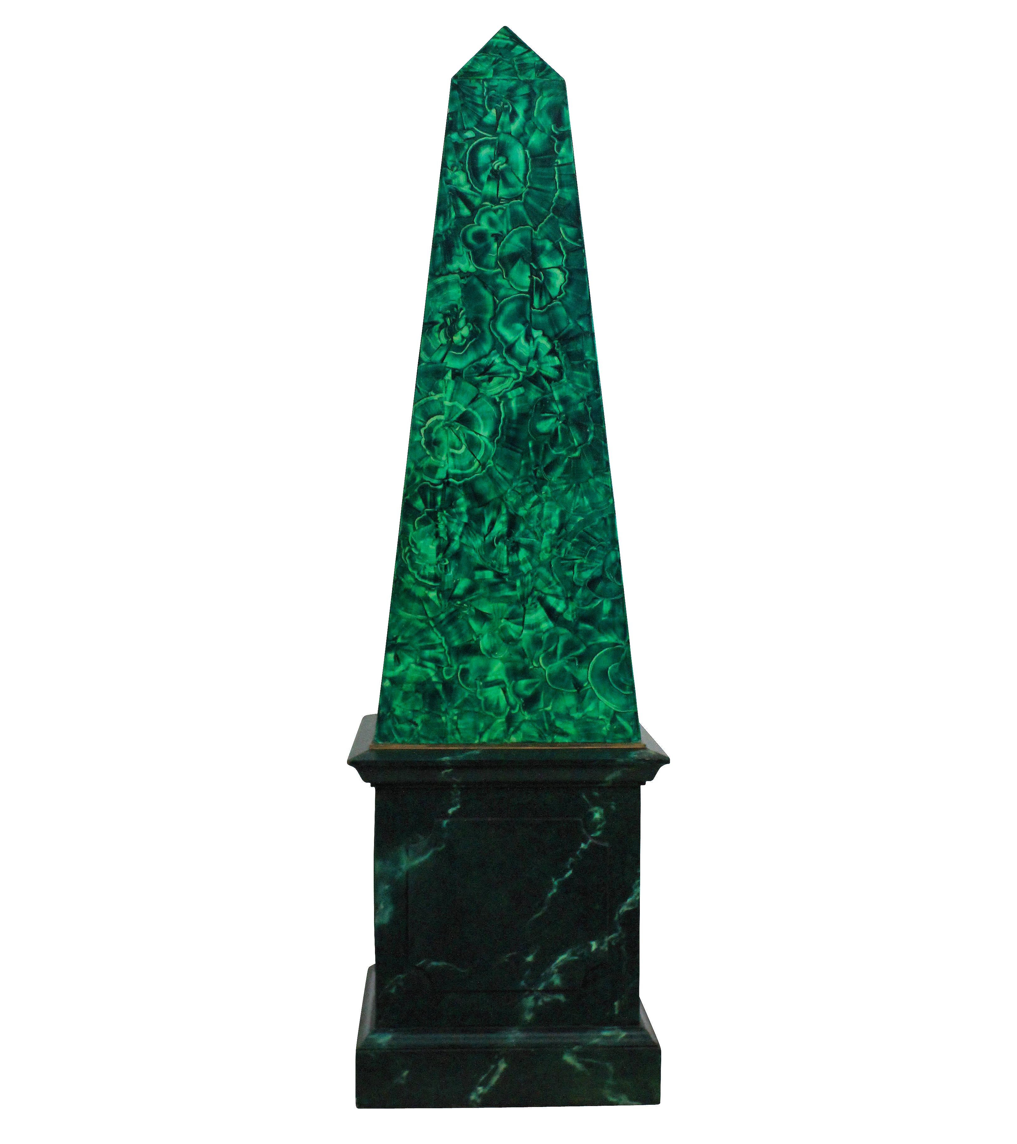 A pair of large French faux malachite obelisks. Of good scale and hand painted.