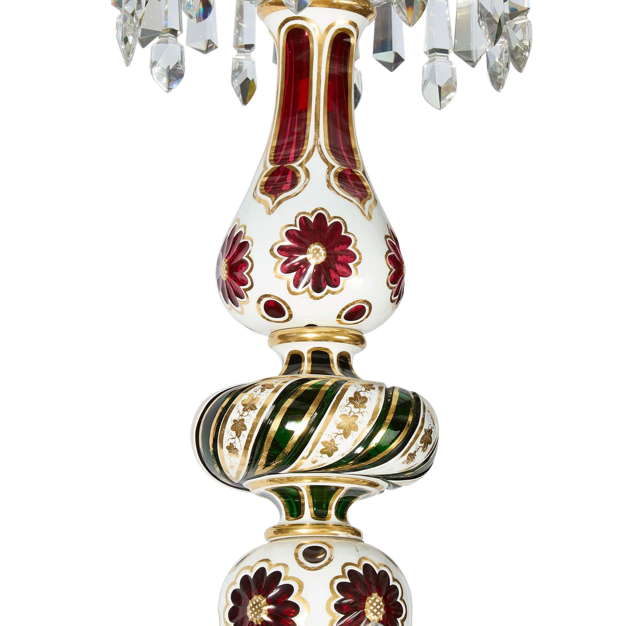 Pair of large French antique overlay glass chandeliers by Baccarat
French, Late 19th Century
Height 150cm, diameter 100cm

This outstanding pair of late 19th century chandeliers, attributed to the celebrated French glassmaker Baccarat highlight a