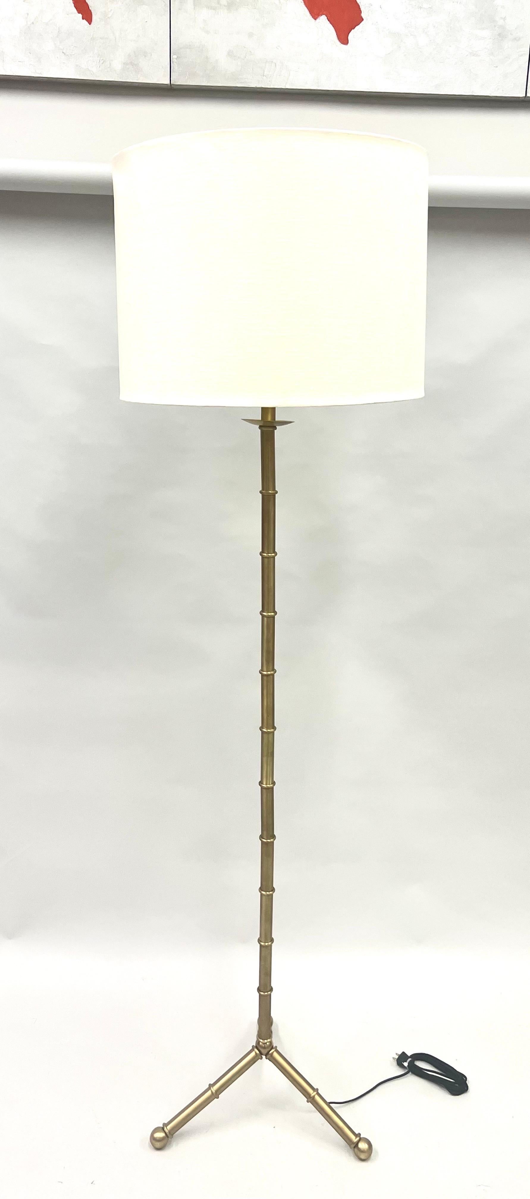 Mid-Century Modern Pair of Large French Brass Faux Bamboo Floor Lamps in the style of Jacques Adnet For Sale