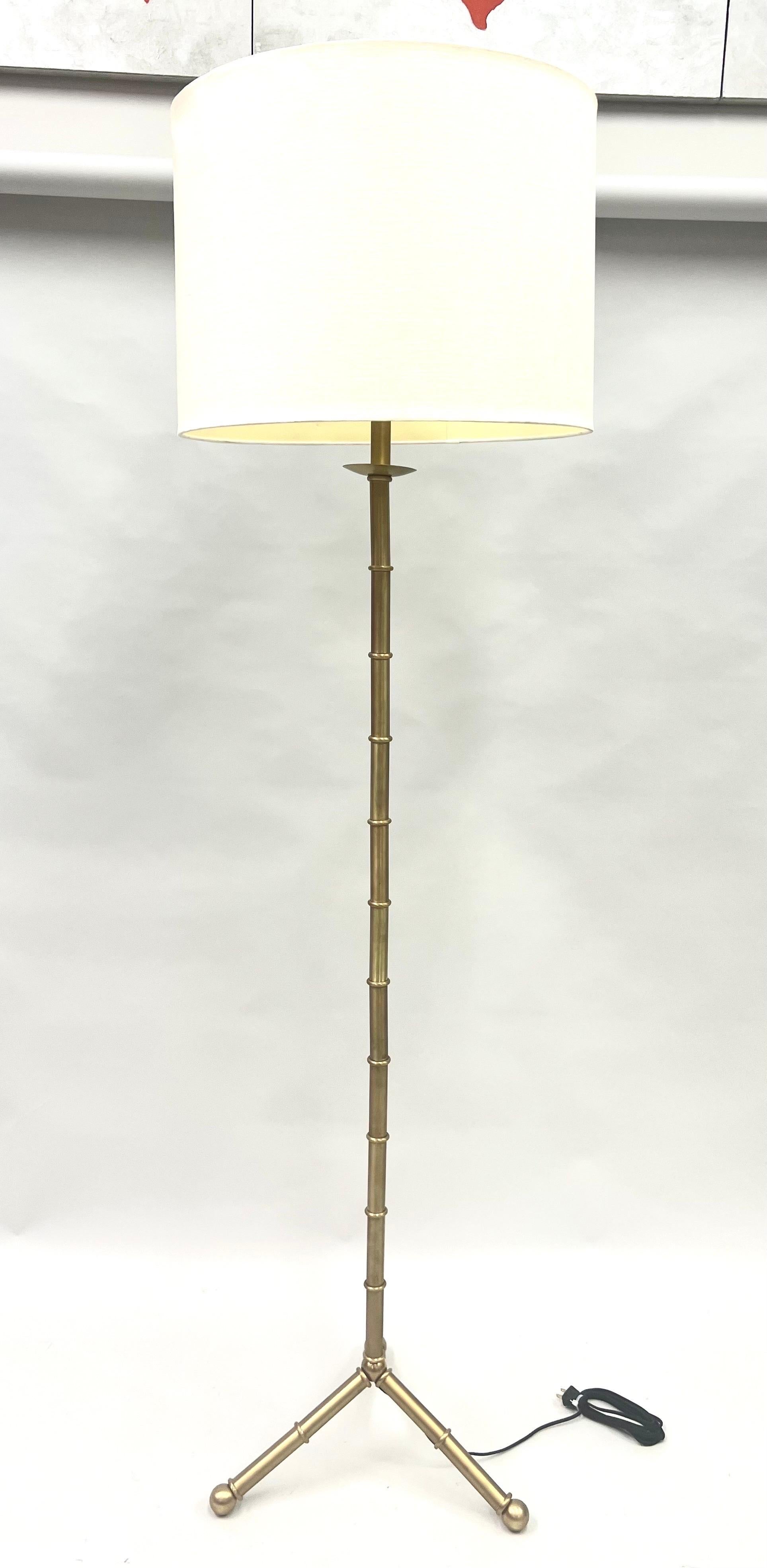 Hand-Crafted Pair of Large French Brass Faux Bamboo Floor Lamps in the style of Jacques Adnet For Sale