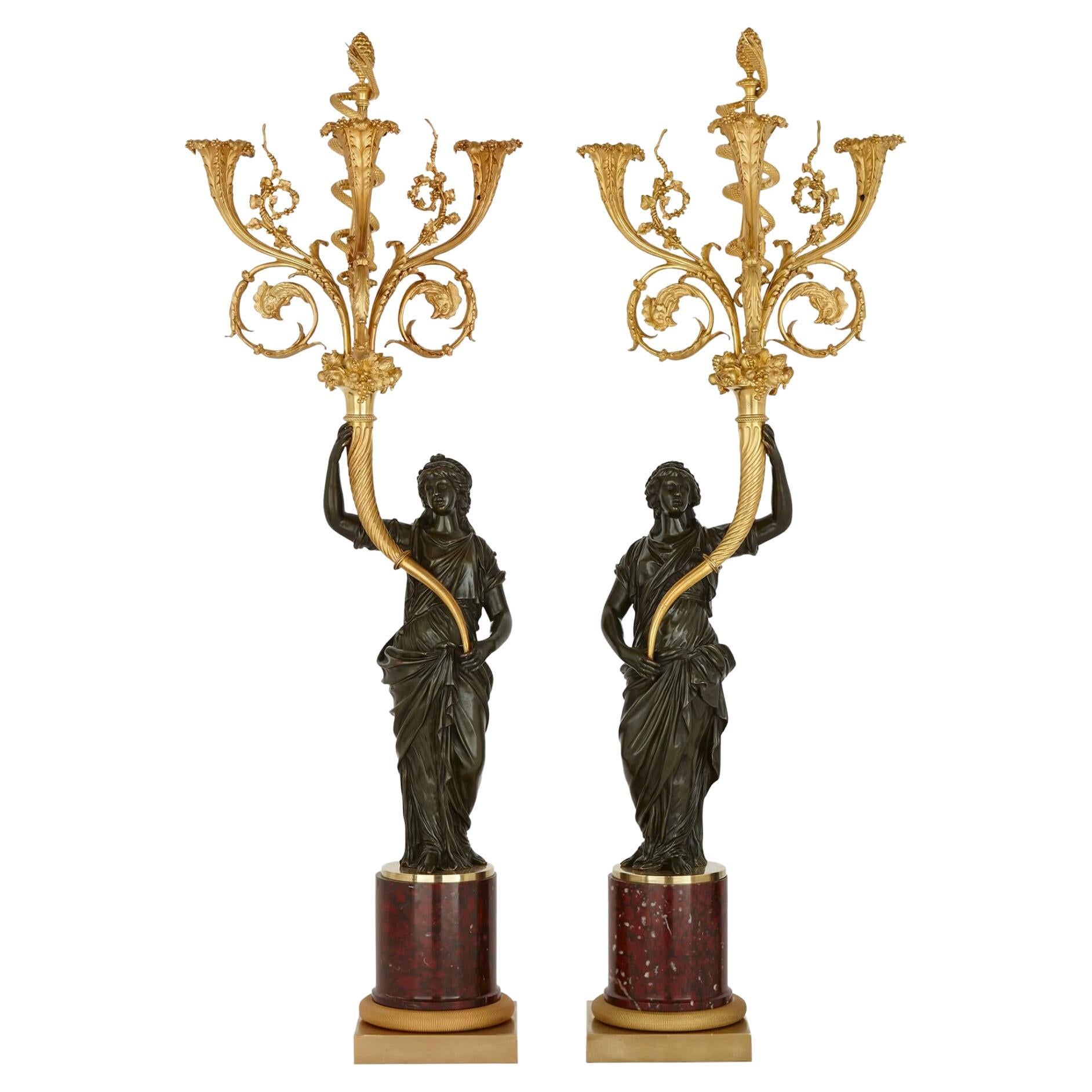 Pair of Large French Bronze and Gilt-Bronze Candelabra