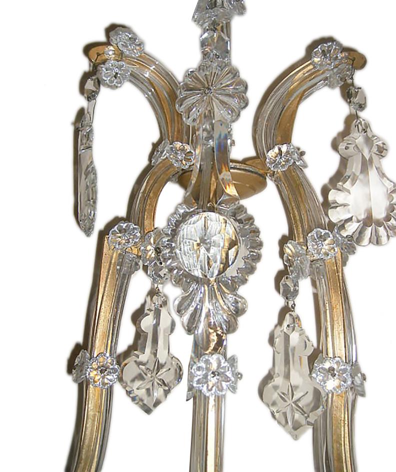Pair of large French circa 1920s molded glass and crystal five-light sconces.

Measurements:
Height 32