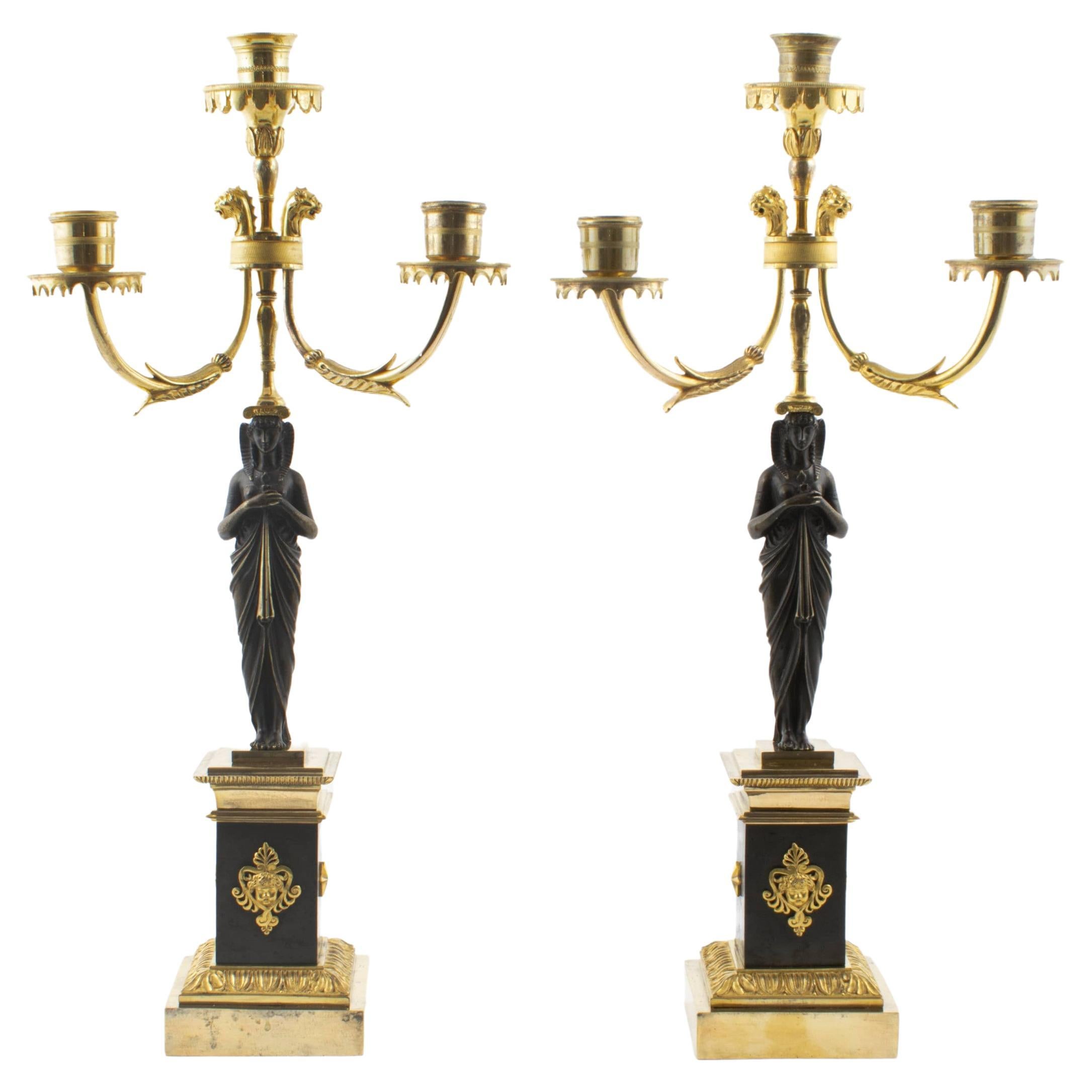 Pair of French Empire Candelabras. Women. Gilded And Patinated Bronze