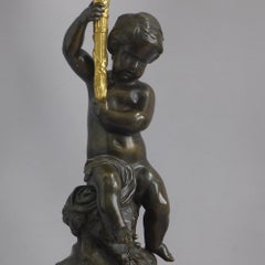 Paire de grands candélabres figuratifs français en bronze patiné, bronze doré et blanc Ma