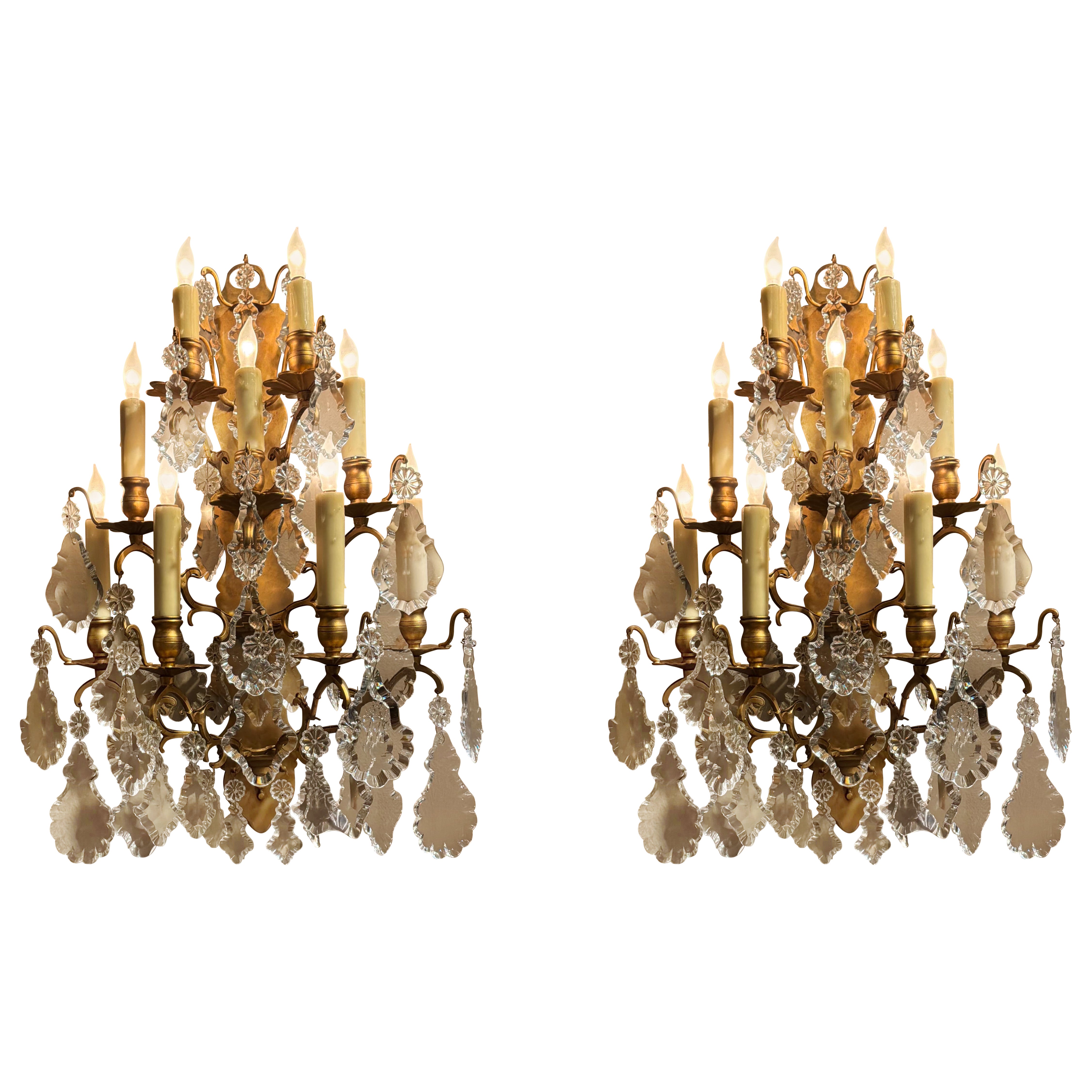 Pair of large French gilt bronze and crystal wall sconces For Sale