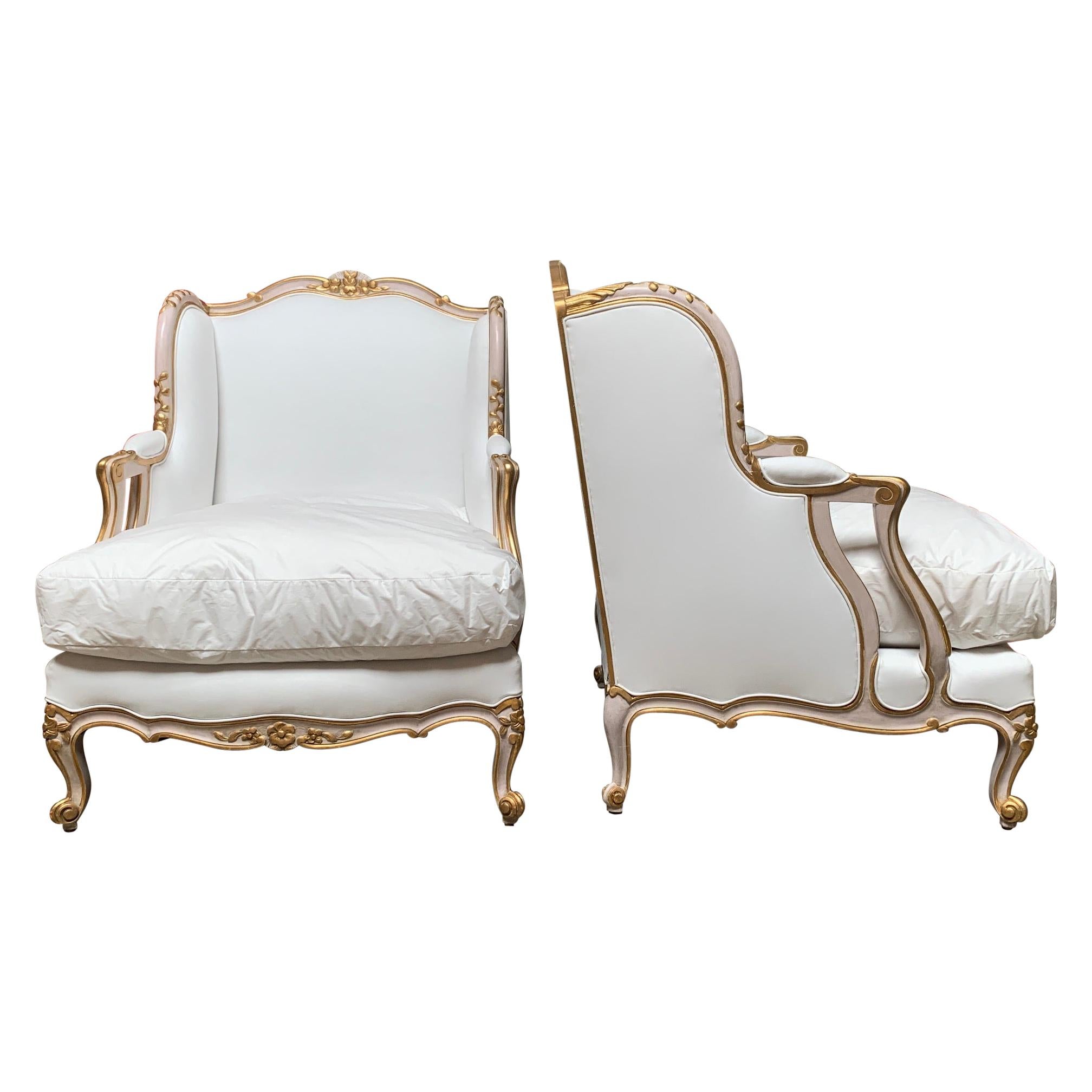 Pair of Large French Louis XV Style Bergeres with a Pink and Gilt Finish For Sale