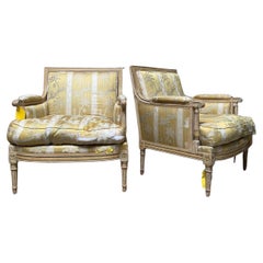 Pair of Large French Louis XVI Style Bergeres with a Painted Finish