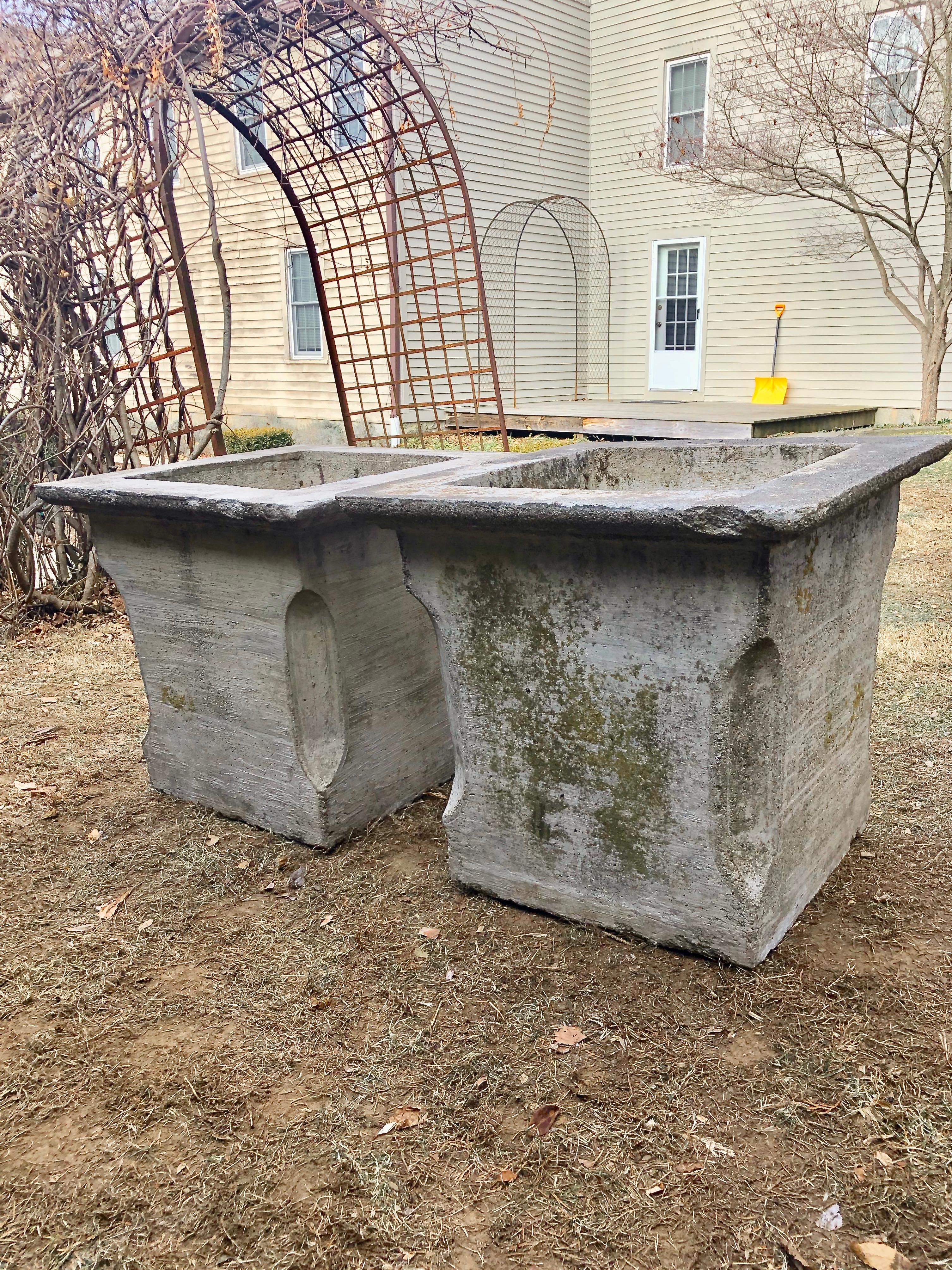 Now these planters really make a statement! Large and substantial, with a lovely lightly-weathered greying surface, they feature very large planting wells that will handle small topiary or a profusion of blooms. Their wide edges and flared corners