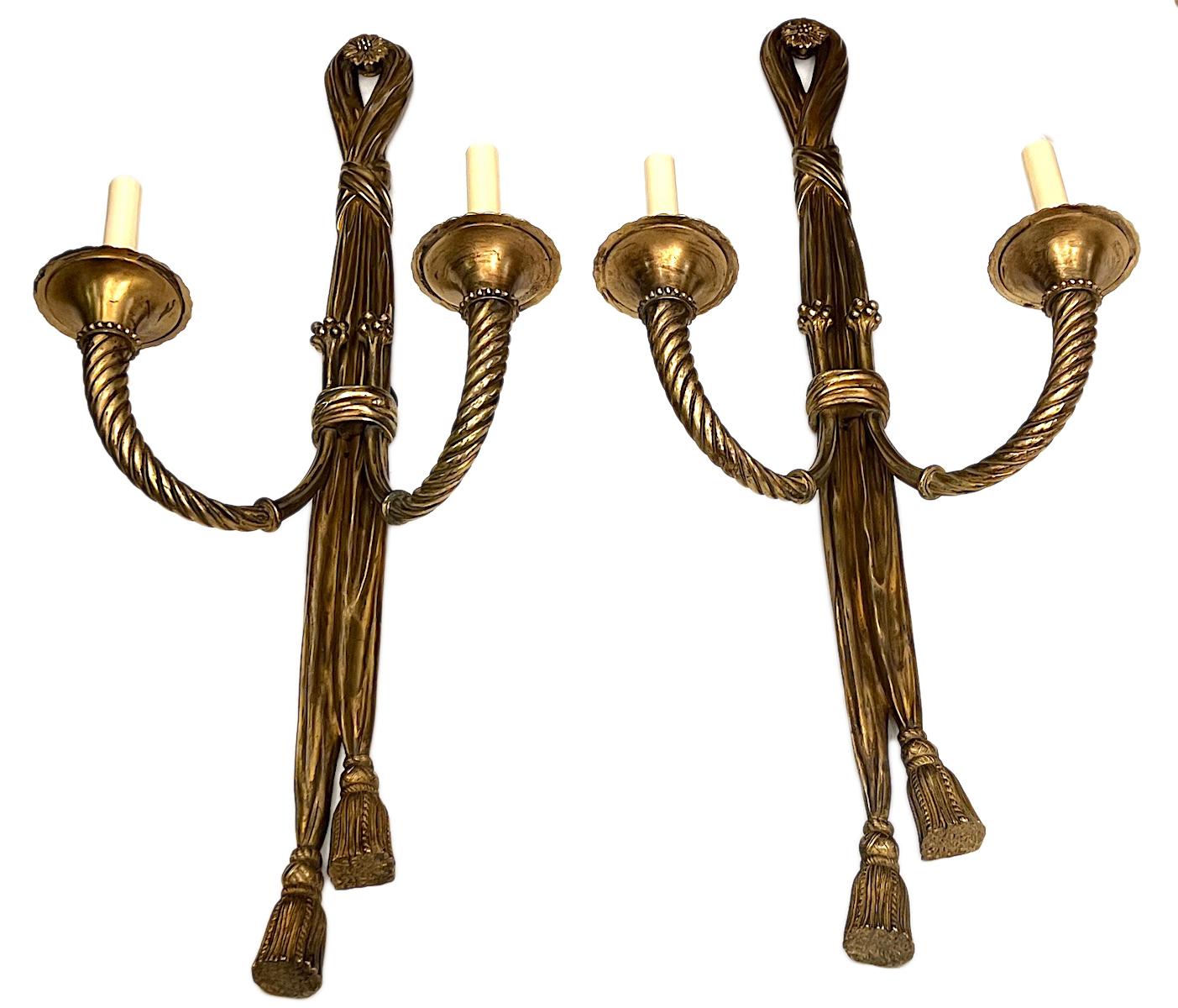 Pair oflarge circa 1920's French cast bronze sconces with original patina.

Measurements:
Height: 33.5