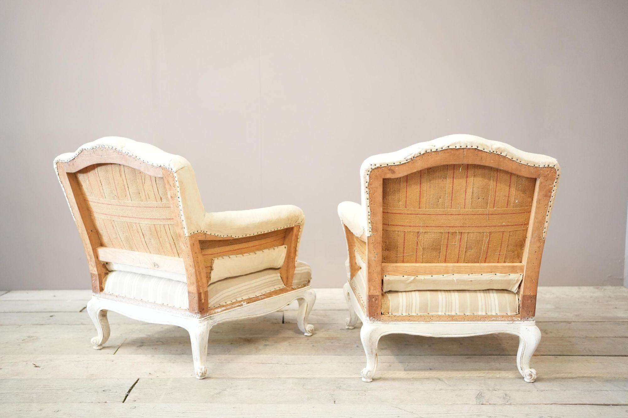Pair of large French shield back armchairs with painted frame 1