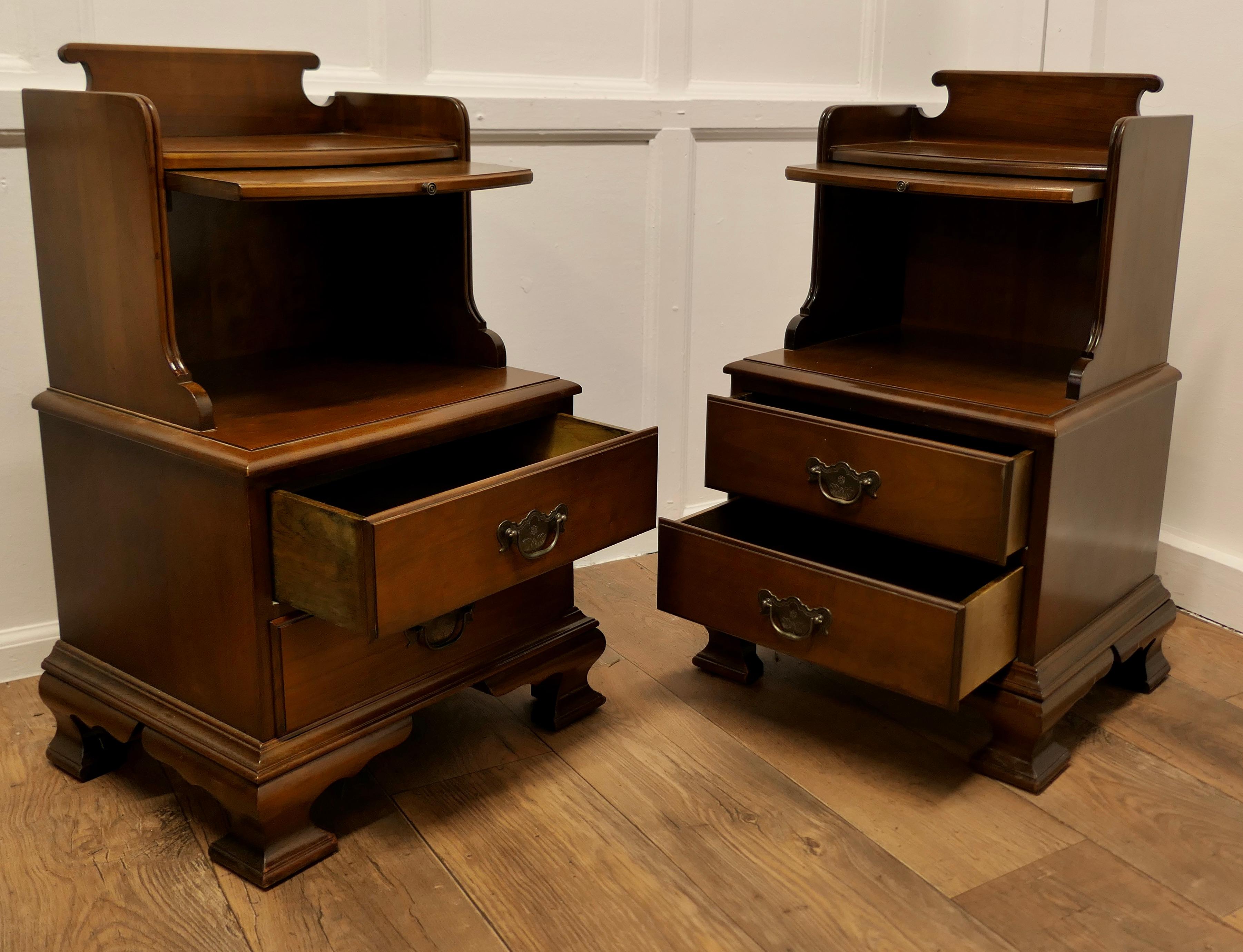 Pair of large French Walnut Bedside Cabinets 

This is a very sturdy pair of cabinets or chevet they are made in solid Walnut and have a a shaped gallery at the top with a bow fronted brushing slide below, the lower section of the table has 2 good