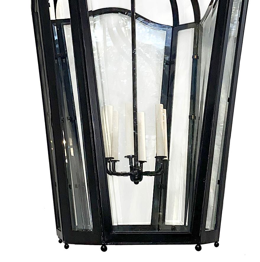 A pair of French circa 1950s wrought iron lanterns with six interior lights. Sold individually.

Measurements:
Height 50