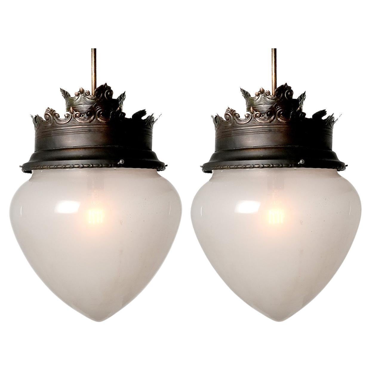 Pair of Large Frosted Acorn Lamps With large Brass Decorative Crown For Sale