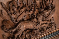 Pair of Large Full-Relief Carved Black Forest Walnut Plaques