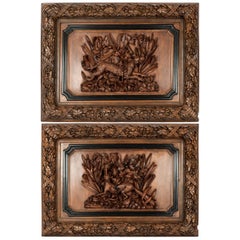 Pair of Large Full-Relief Carved Black Forest Walnut Plaques