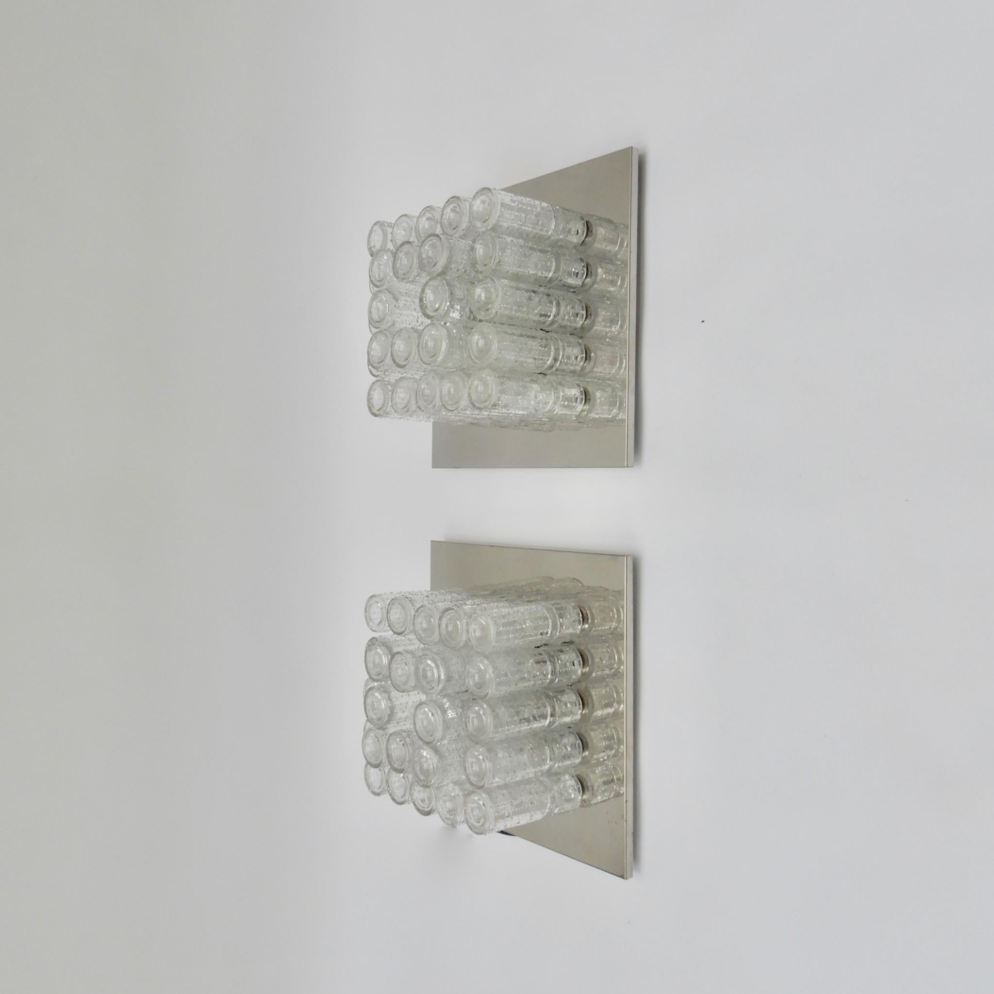 Pair of large German glass and chrome square wall sconces, 1970s.