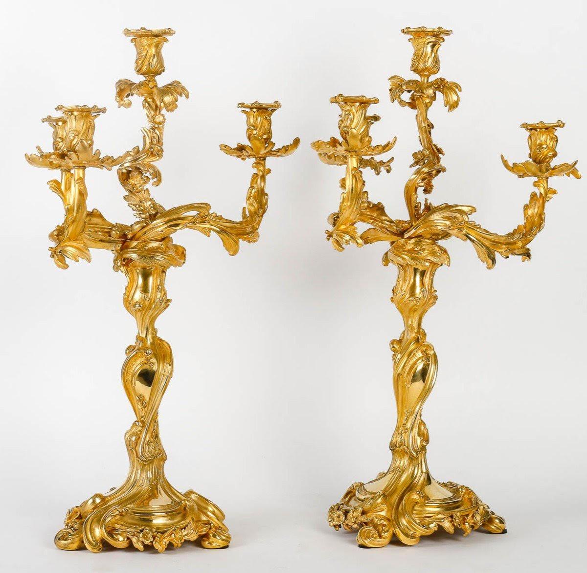 Pair of large ormolu candelabra, Louis XV style, 19th century.

Pair of Rocaille style Candelabras, Louis XV, 19th century in chased and gilt bronze, Napoleon III period.
h: 62.5cm, w: 39cm, d: 39cm