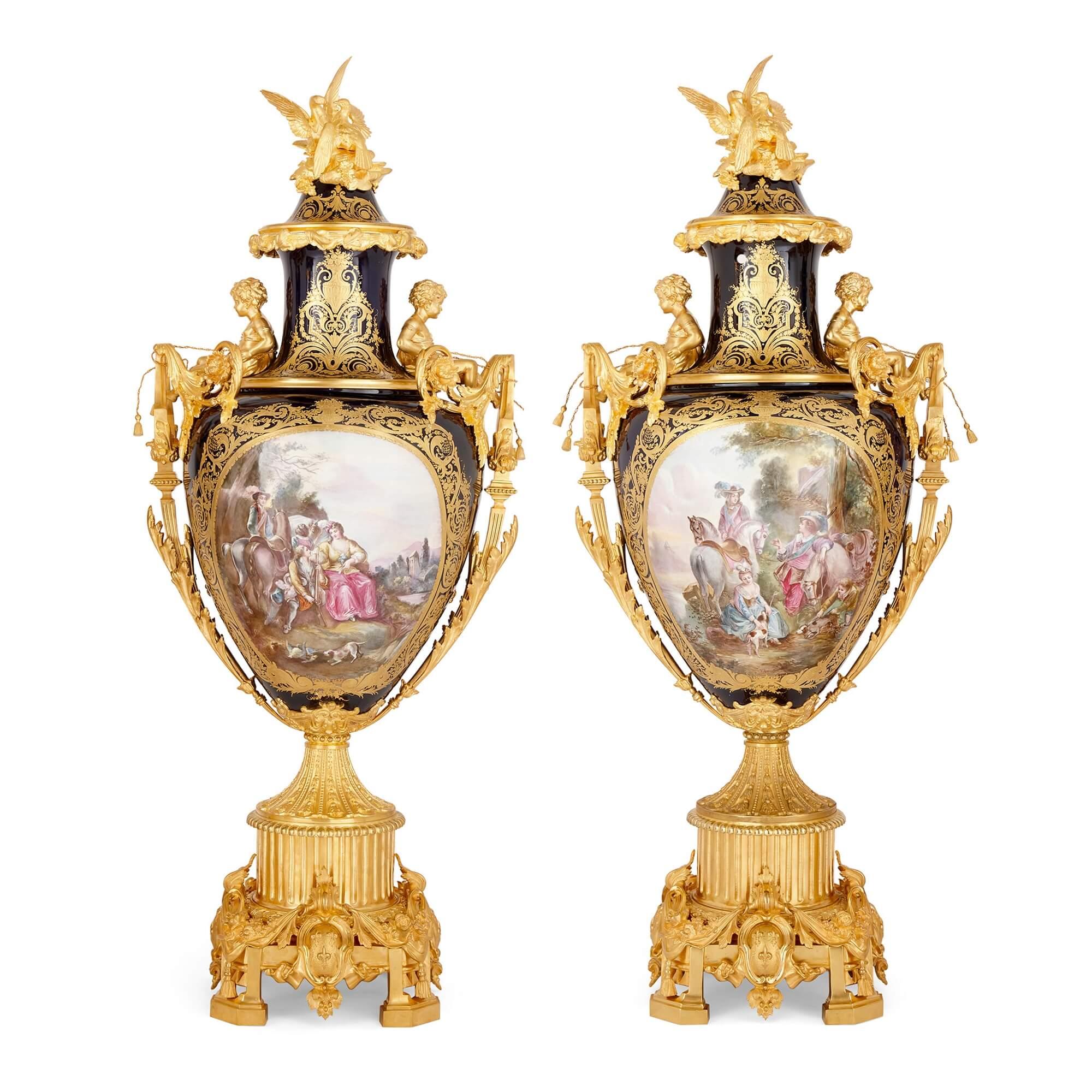 Pair of large gilt-bronze mounted Sèvres-style porcelain vases with pedestals
French, Early 20th century
Measures: Vases: height 141cm, width 60cm, depth 44cm
Stands: height 66cm, width 43cm, depth 43cm

Each of the three vases is of ovoid