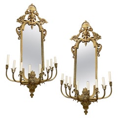 Coppia di grandi appliques in bronzo dorato