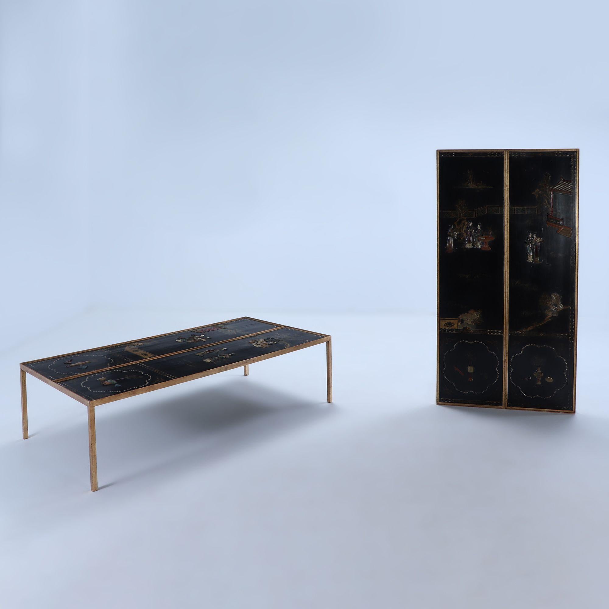 A pair of gilt iron and wood coffee tables with glass tops (not shown) having Chinese lacquered wood inserts C 1940. The two can be used individually and they measure approximately 34