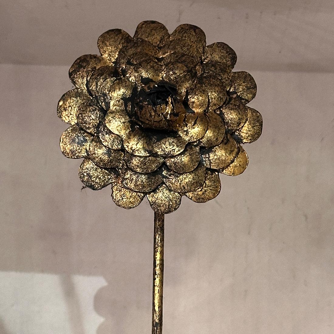 A pair of circa 1940s Italian gilt iron double light sconces with flower detail.

Measurements:
Height 22