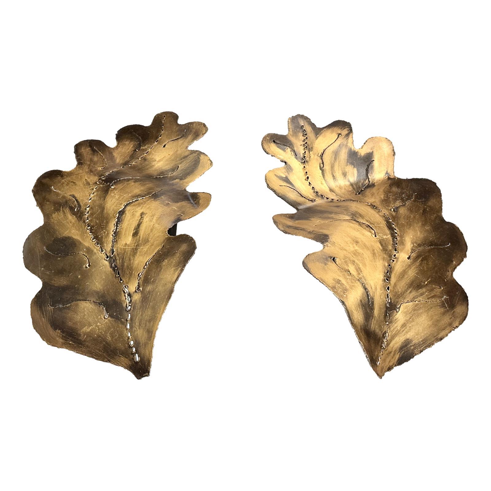 Pair of large circa 1960's Italian gilt metal and patinated sconces with one Edison light behind each leaf.

Measurements:
Height: 26.5
