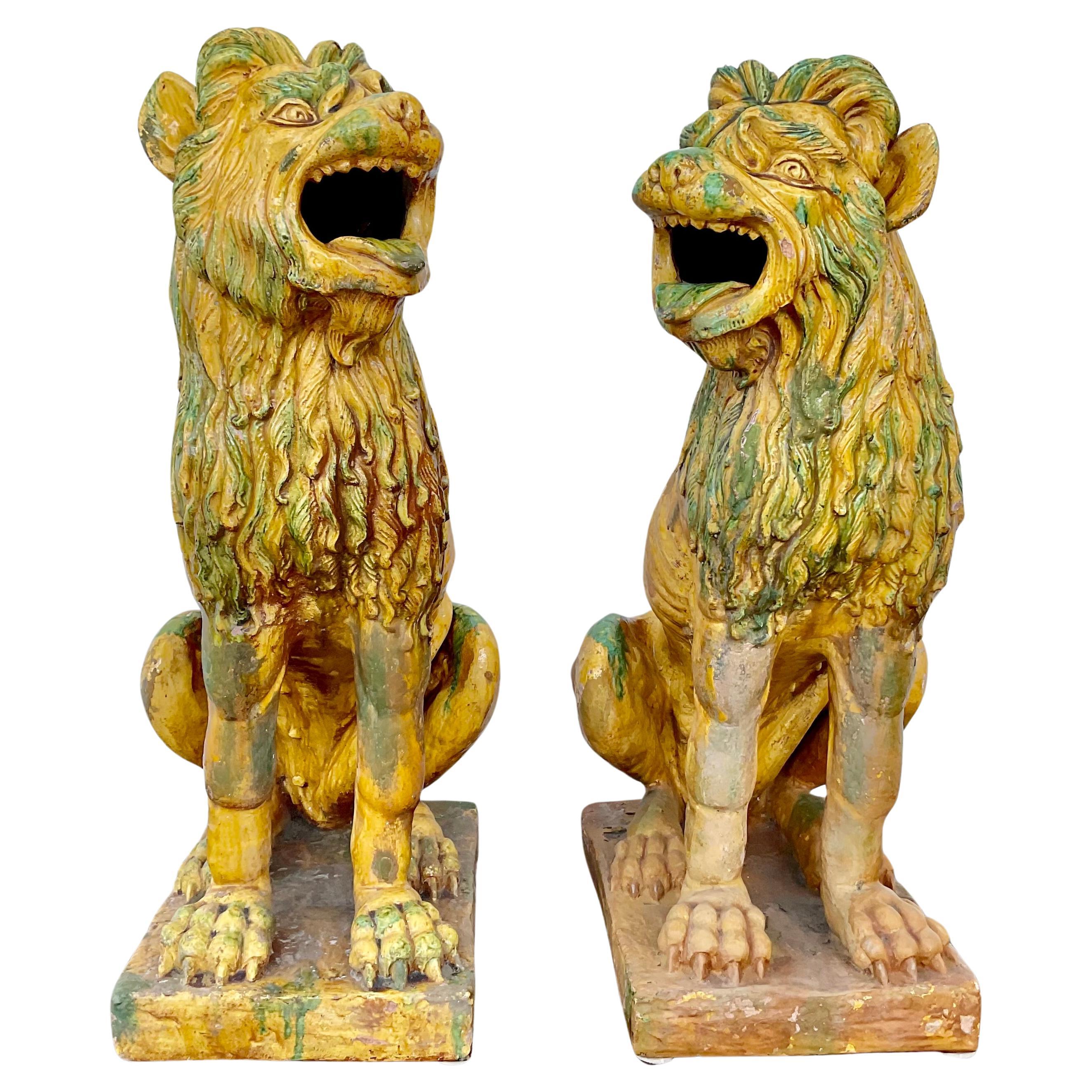 Chinoiserie Pair of Large Glazed Terra Cotta Lions or Foo Dogs For Sale