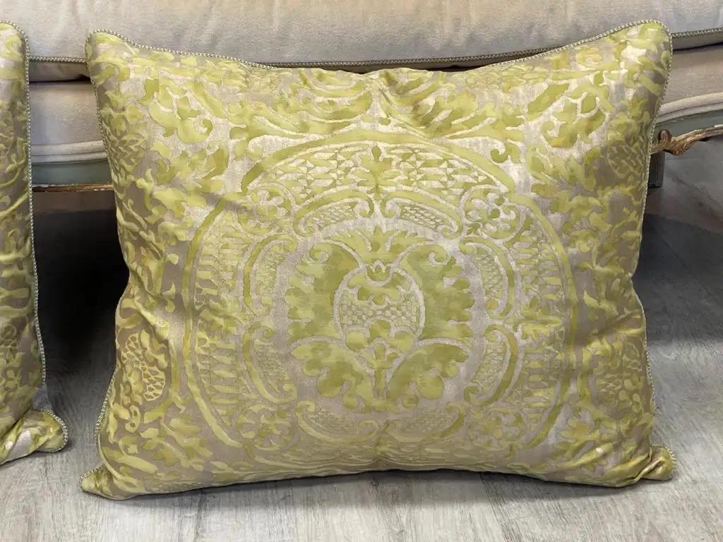 A lovely air of large gold and chartreuse Fortuny Pillows.  22” w. x 18” l. x 6” d. 
