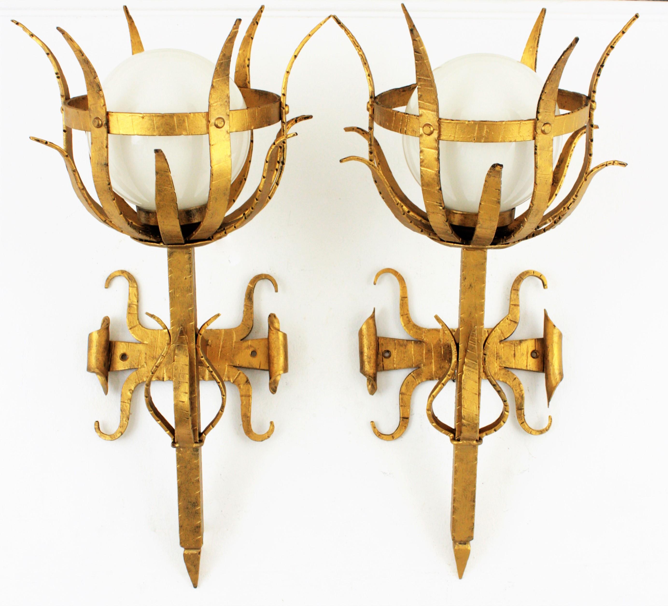 Pair of Large Gothic Style Gilt Iron & Opaline Glass Torch Wall Lights / Sconces In Excellent Condition In Barcelona, ES