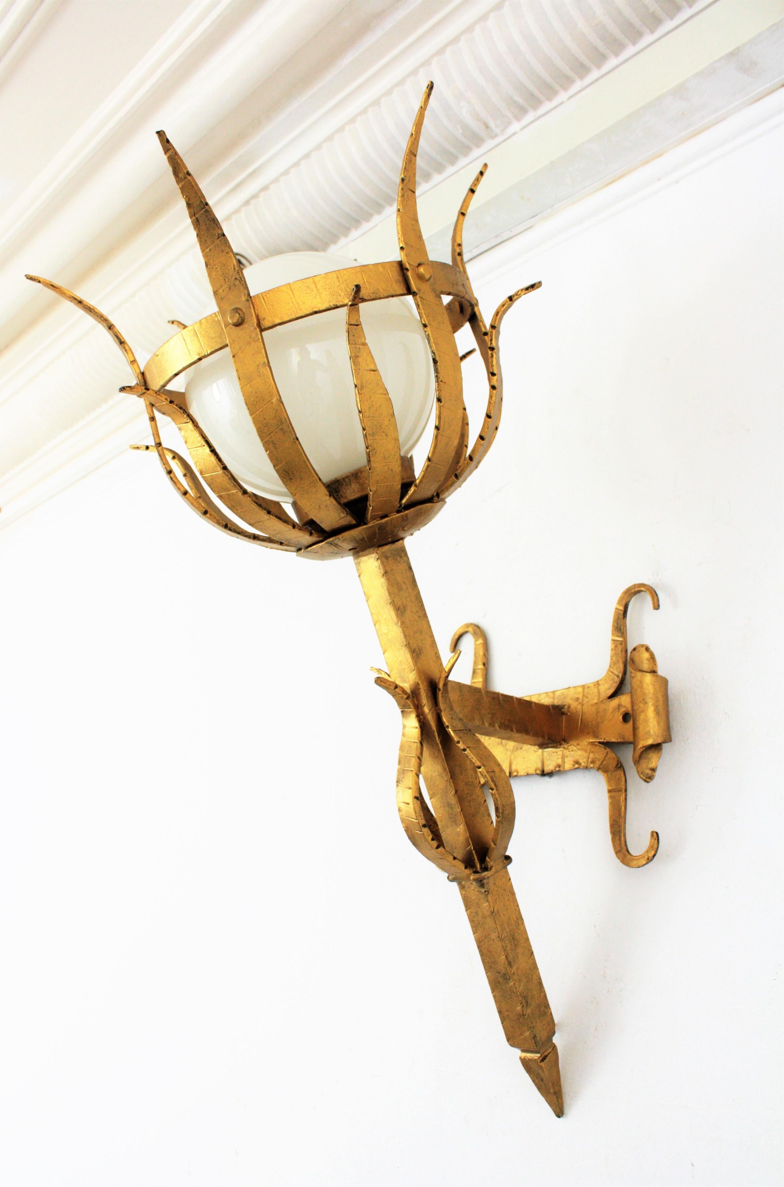 Mid-20th Century Pair of Large Gothic Style Gilt Iron & Opaline Glass Torch Wall Lights / Sconces