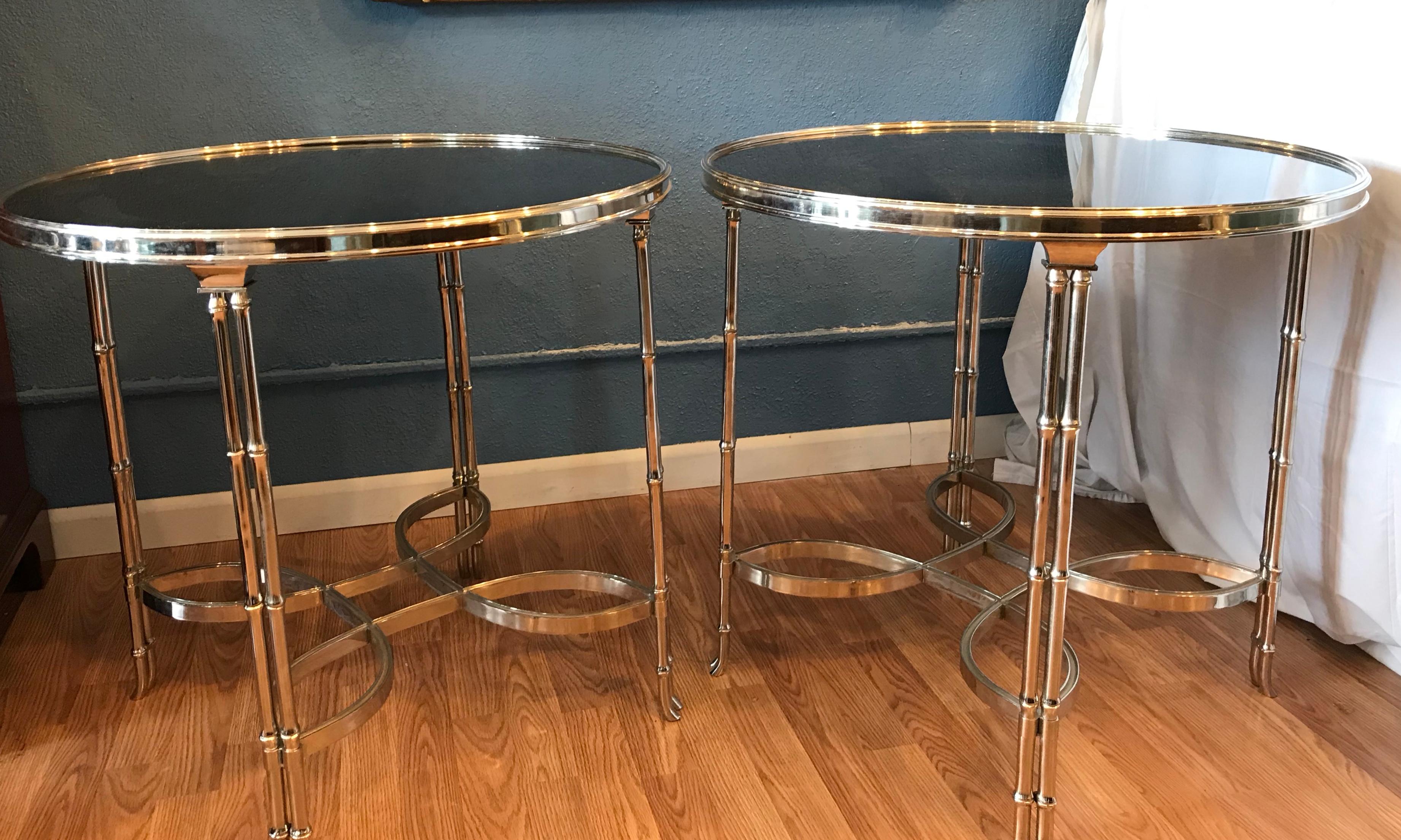 Fabulous quality and dramatic scale. The tables are finely detailed 
with faux bamboo legs and mirror finished black stone tops.
The chrome trim glistens.