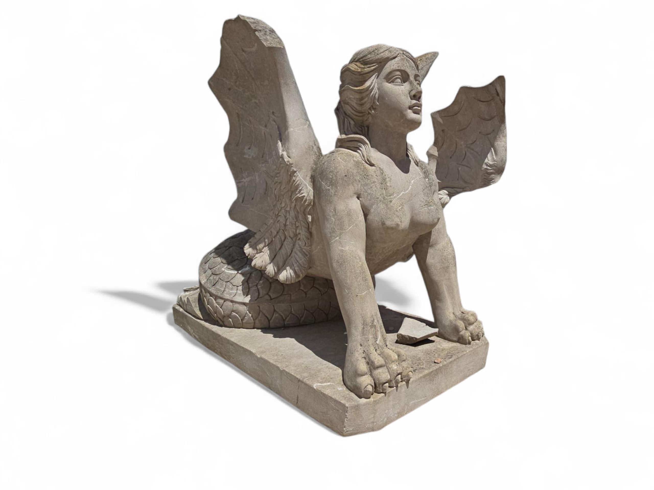 Unique and monumental pair of hand-carved stone sphinxes crafted in Italy during the 1950s. Each fantastical creature features a human head, bat-like wings, and a dragon's body—merging mythological influences with bold artistic imagination. The