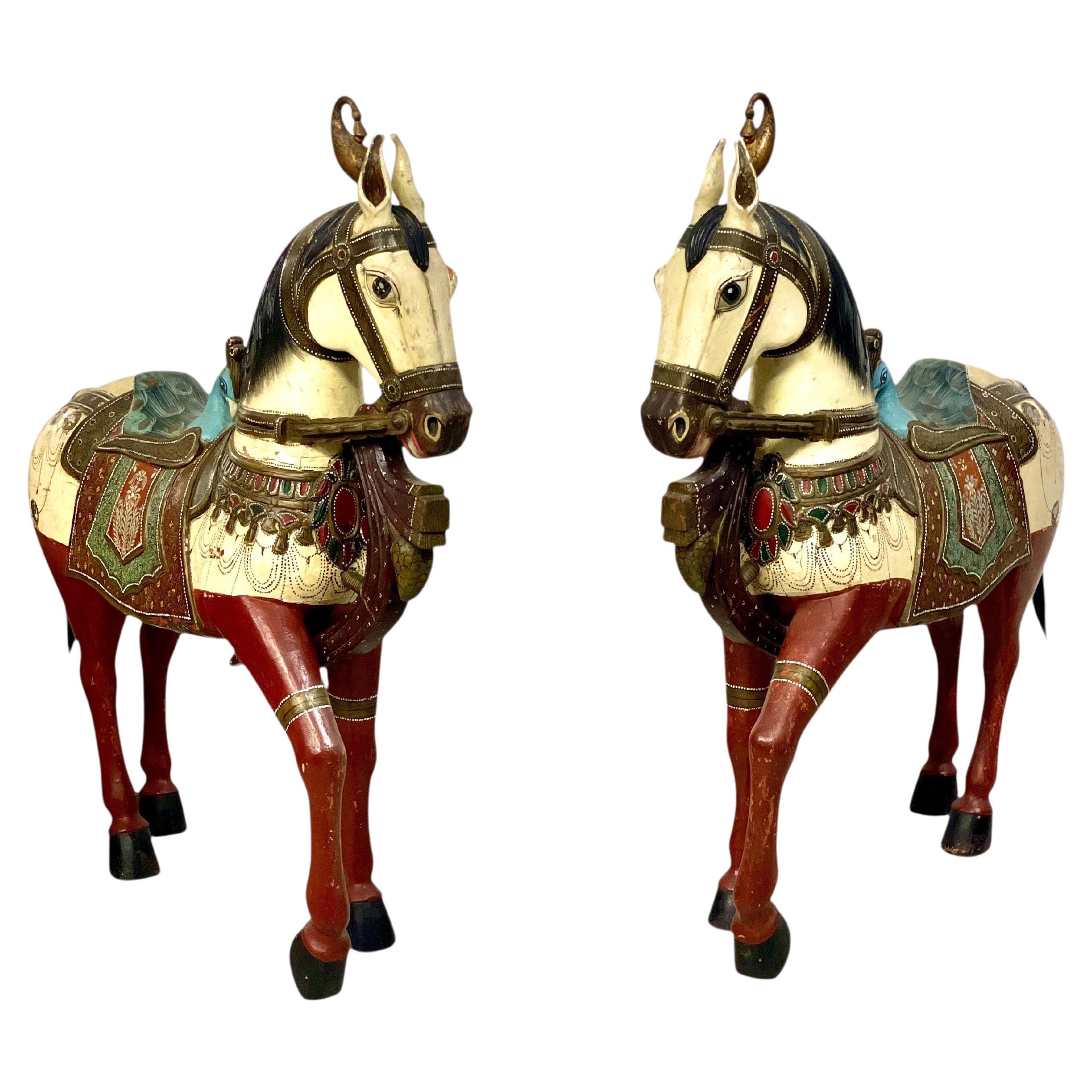 Pair of Large Hand-Painted Indian Horses with Peacock Saddles