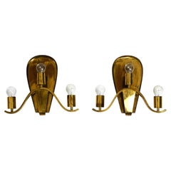 Pair of large heavy Mid Century brass wall lights from a German church