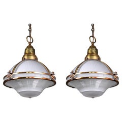 Pair of Large Holophane Prismatic Glass and Copper Gilt Caged Pendants Lights
