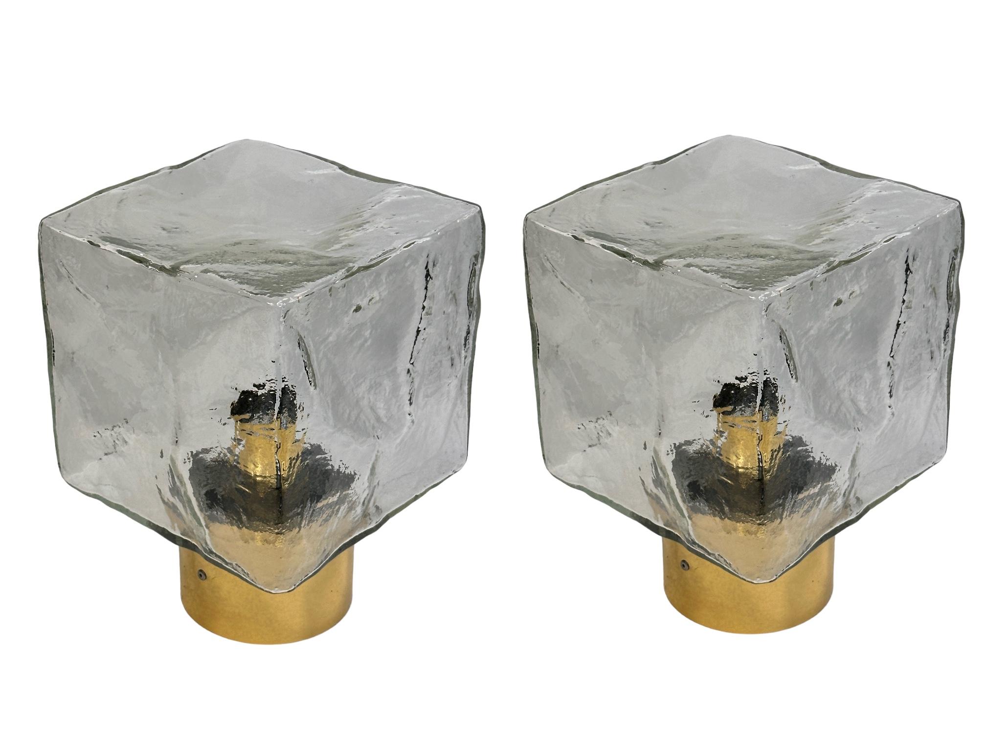 A stunning pair of Ice Glass Cube Flush Mounts by Kalmar Austria. Each consisting of a Mid-Century Modern style design. Each fixture requires an European E27 / 110 Volt Edison bulb, each bulb up to 100 watts. Found at an estate sale in Vienna,
