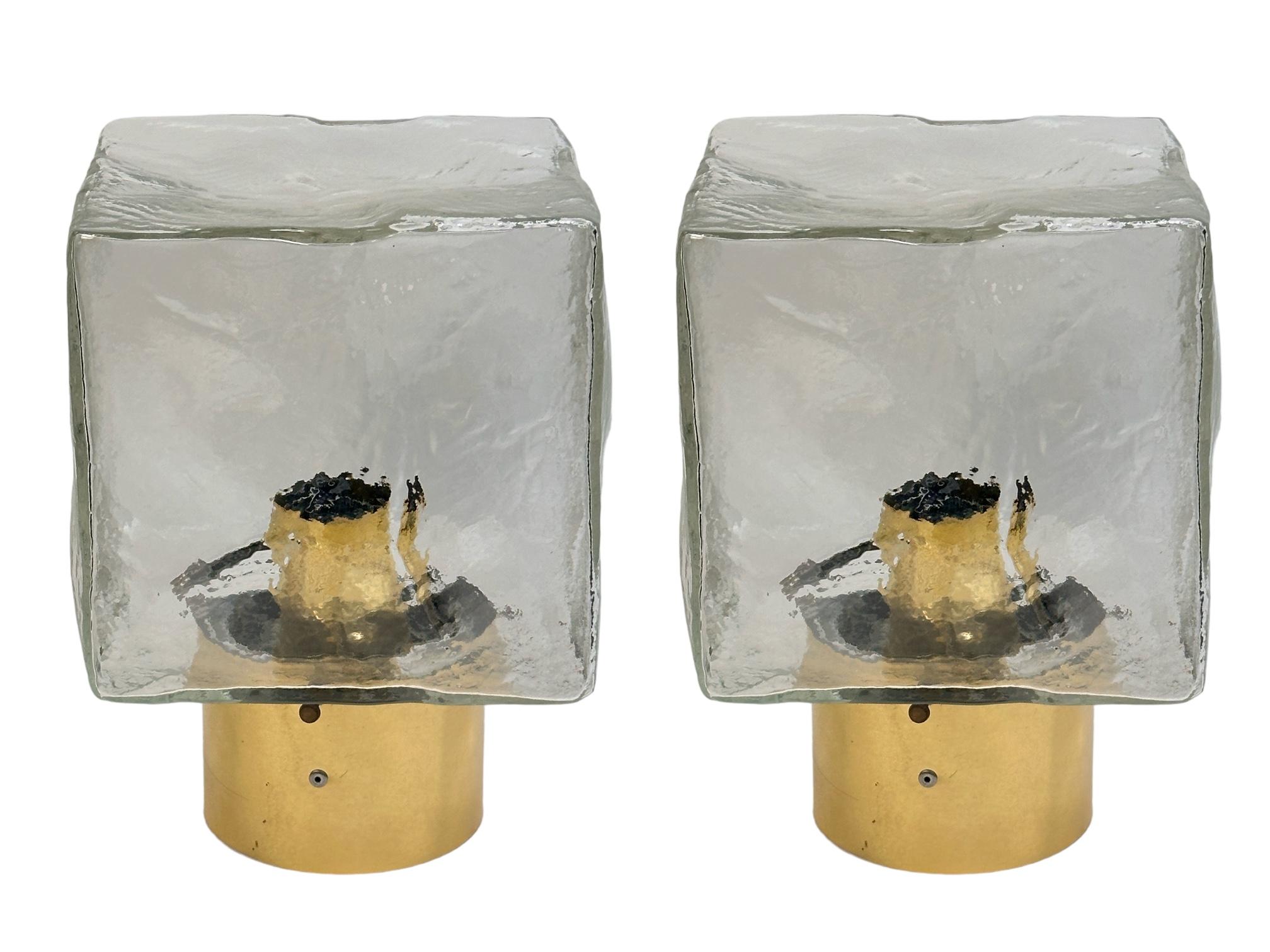 A stunning pair of Ice Glass Cube Flush Mounts by Kalmar Austria. Each consisting of a Mid-Century Modern style design. Each fixture requires an European E27 / 110 Volt Edison bulb, each bulb up to 100 watts. Found at an estate sale in Vienna,