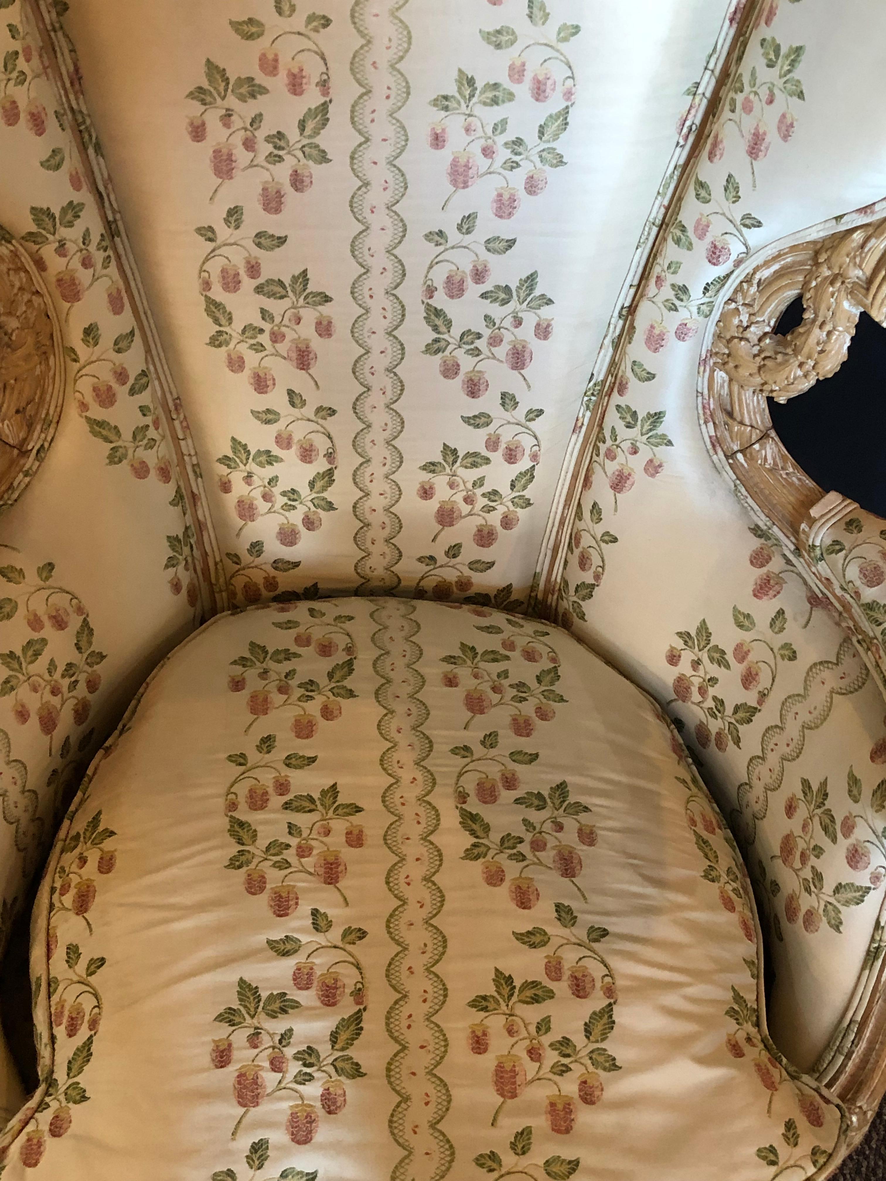 Upholstery Pair of Large Impressive High Back Distressed Carved Framed Wing Back Armchairs For Sale