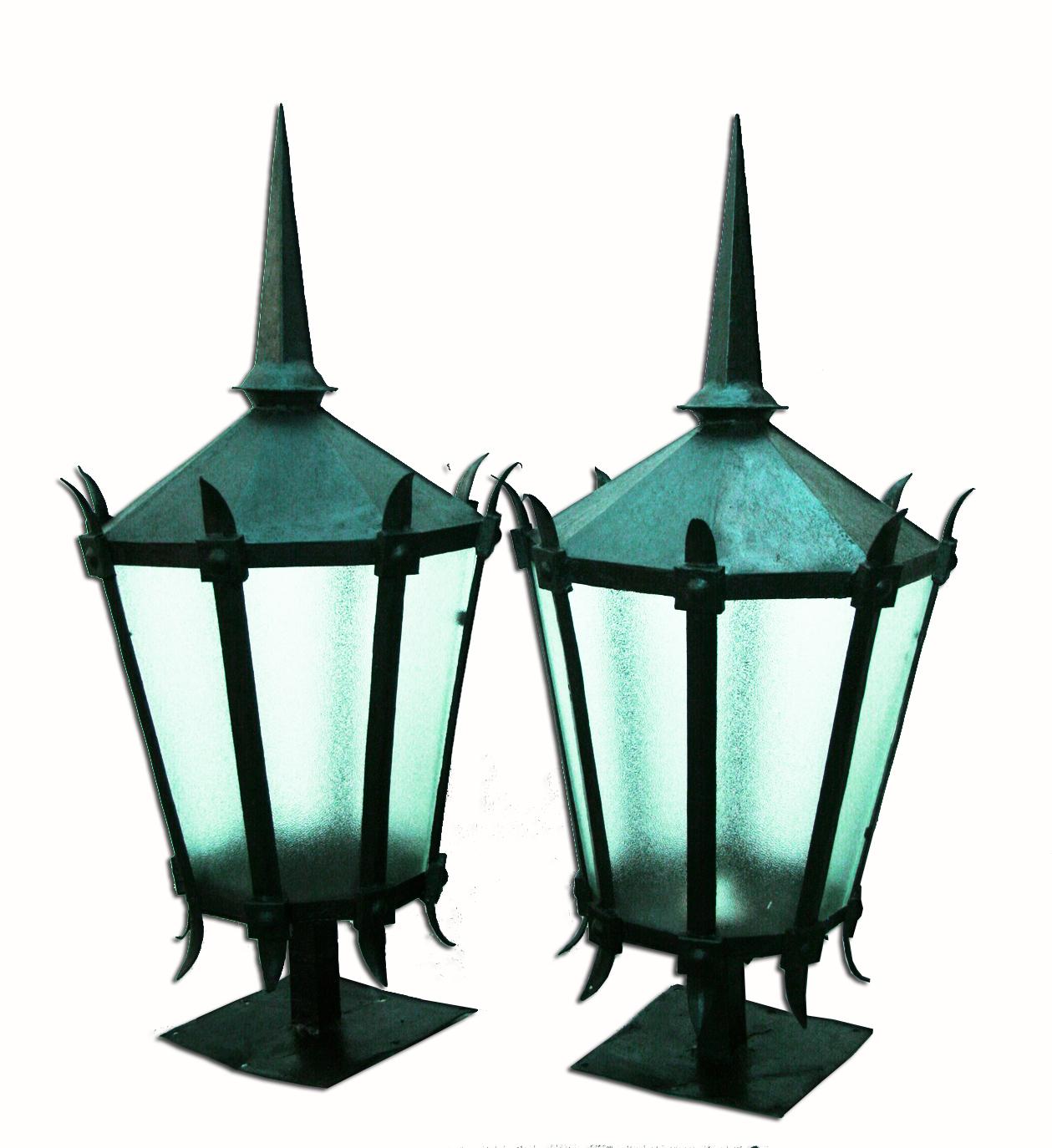 These lanterns of large dimensions were made by hand by a master craftsman for the door of some Italian villa throughout the 19th century or Early 20th Century

Nothing common. This decorative pair of outdoor lanterns, has a very attractive and