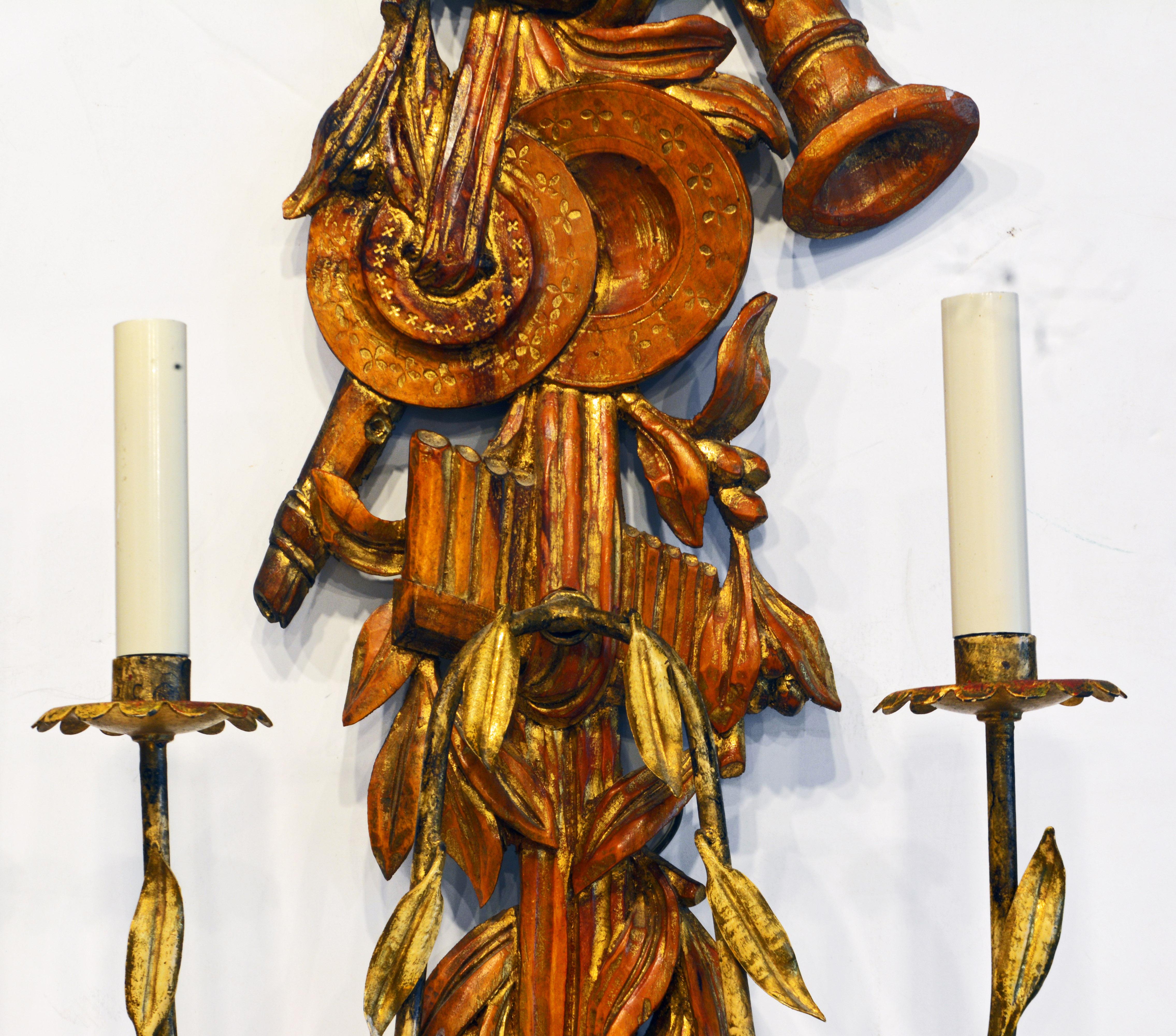 Rococo Pair of Large Italian Carved Gilt and Wood Two Arm Musical Themed Wall Sconces