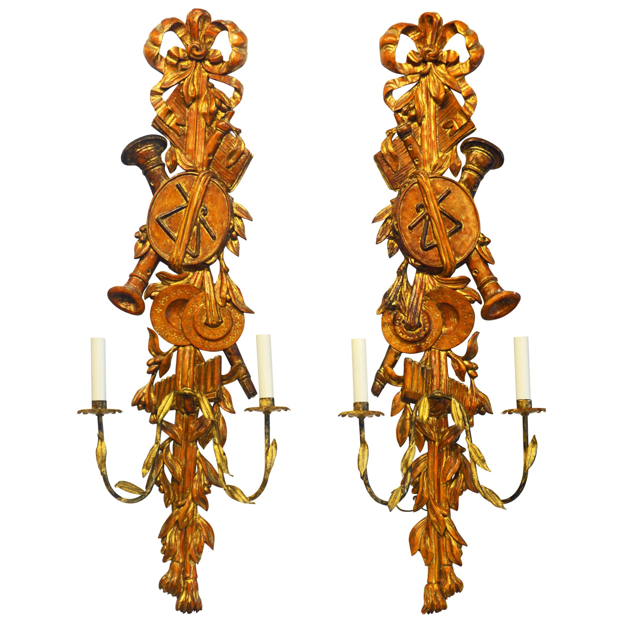 Pair of Large Italian Carved Gilt and Wood Two Arm Musical Themed Wall Sconces