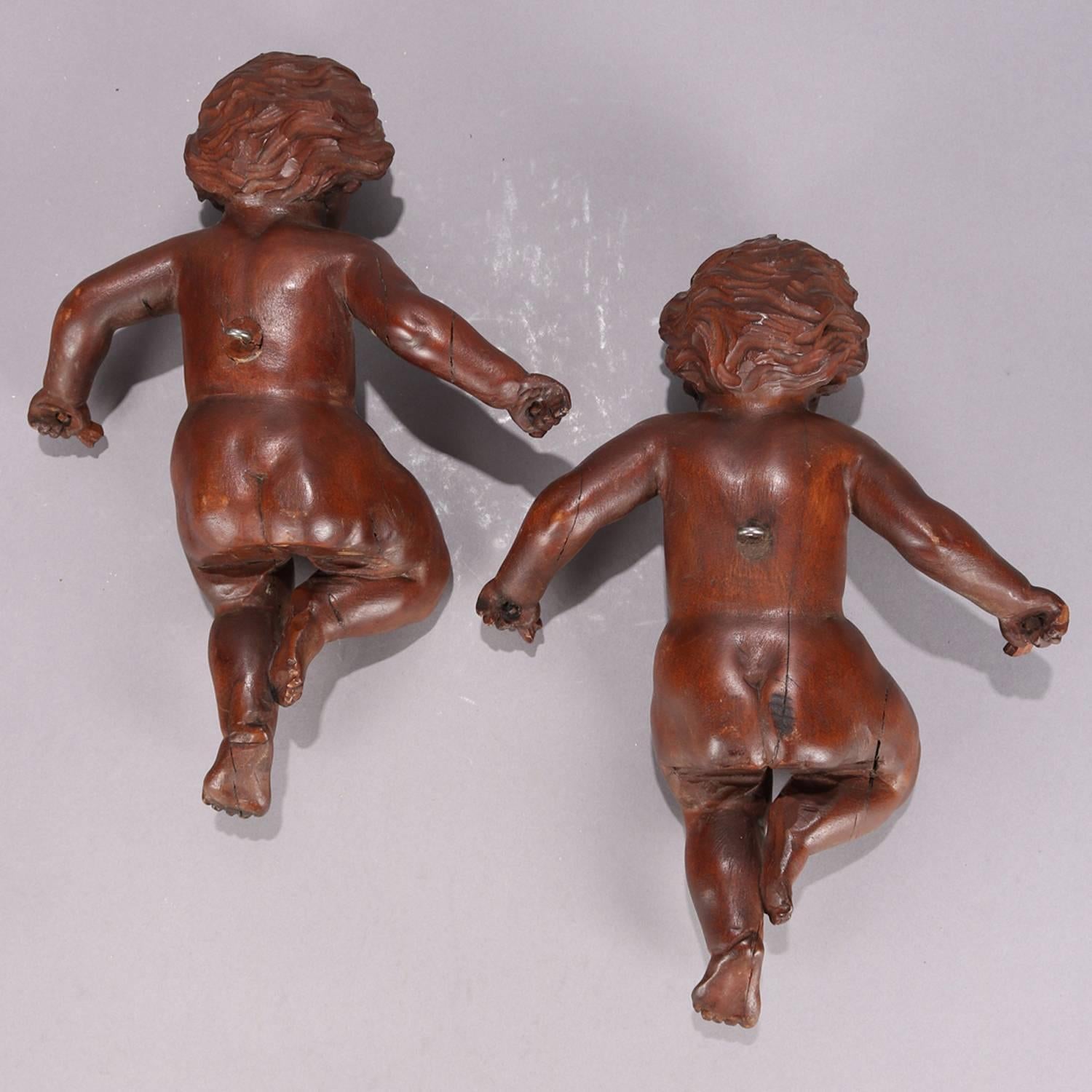 Pair of Large Italian Carved Walnut Figural Wall Sculptures of Cherubs In Good Condition In Big Flats, NY