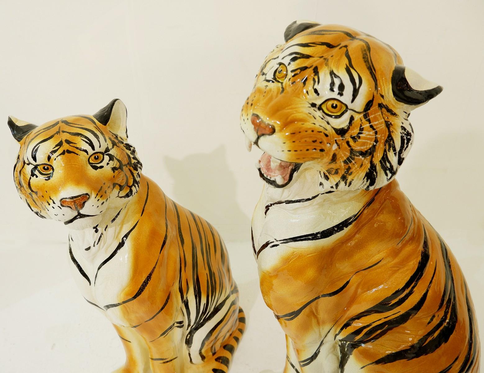 Pair of large Italian glazed terracotta tigers.