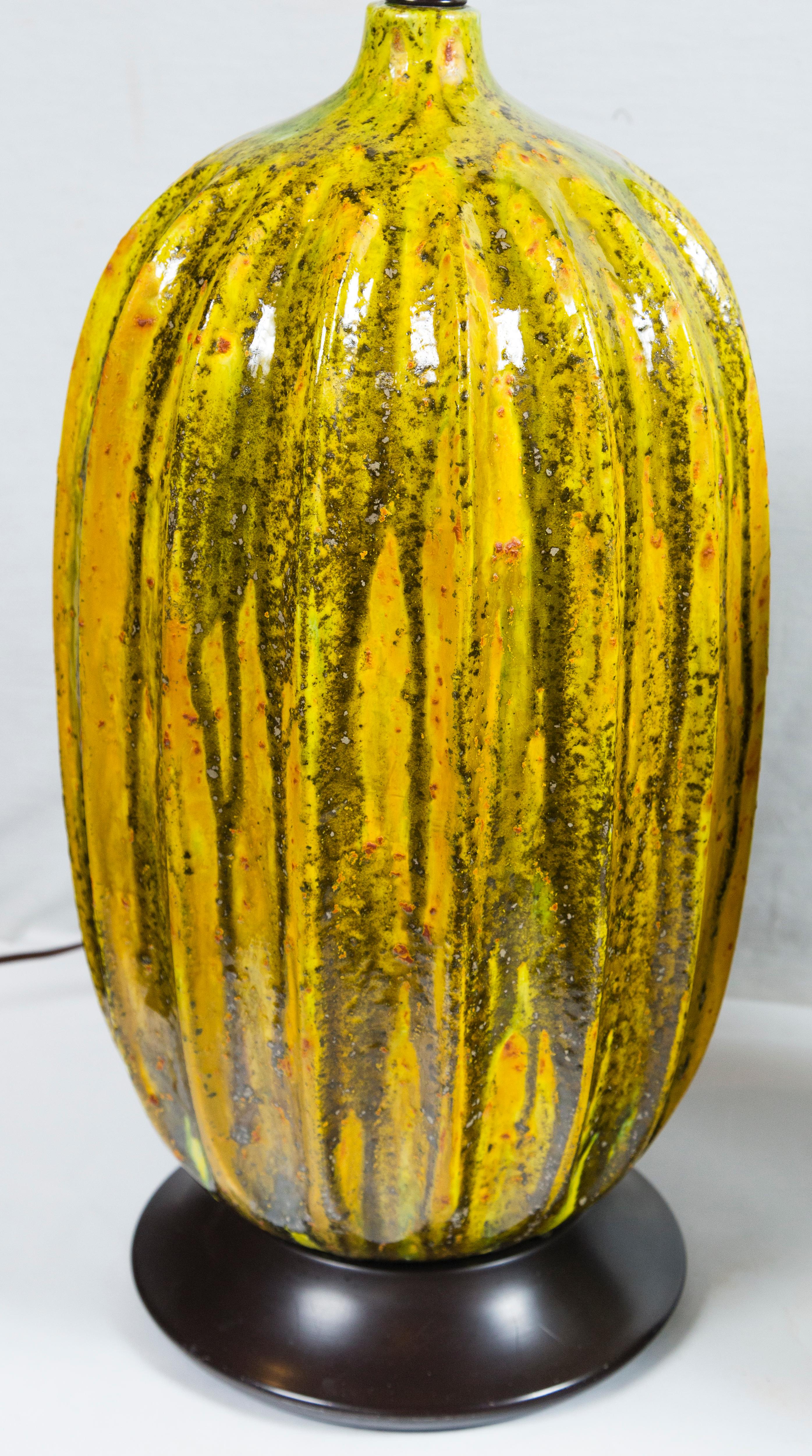 Very large chartreuse and olive green melon form ceramic lamps from Italy.