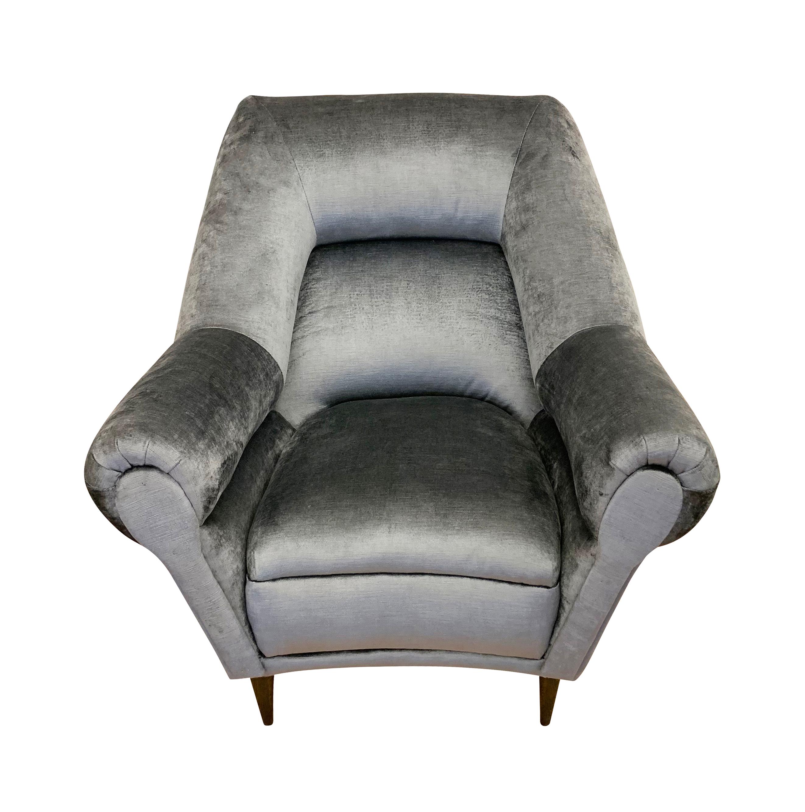 Pair of large Italian lounge chairs from the 1960s recently recovered in a gray velvet. Price per pair but can be sold individually on request.

Condition: Minor wear consistent with age and use. Recently recovered.