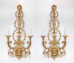 Pair of Large Italian Neoclassical Carved Giltwood Two-Light Wall Sconces
