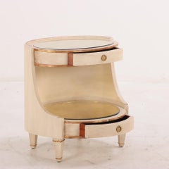 Pair of large Italian painted and giltwood oval nightstands, C 1950.